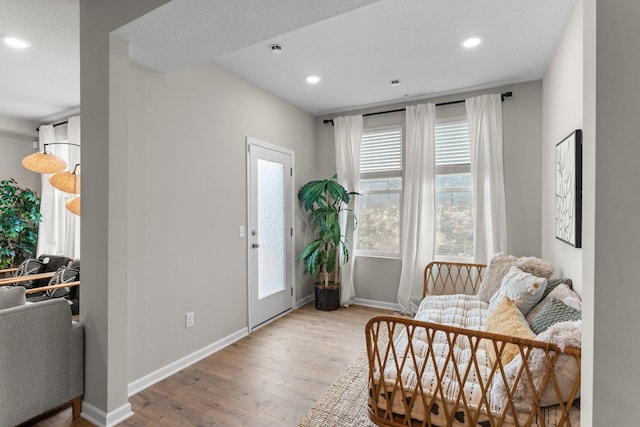 5322 94th Ln N, Brooklyn Park, MN 55443 - foyer featuring wood finished floors, recessed lighting, and baseboards