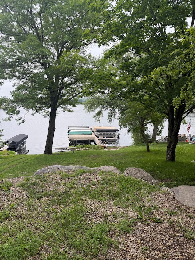 3749 Pershing St SW, Prior Lake, MN 55372 - dock featuring a water view, boat lift, and a lawn