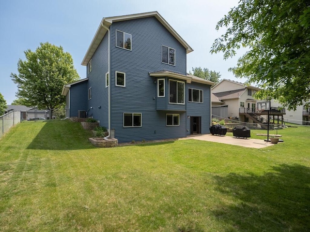 15564 Vale St NW, Andover, MN 55304 - back of house with a patio area, stairs, and central air condition unit