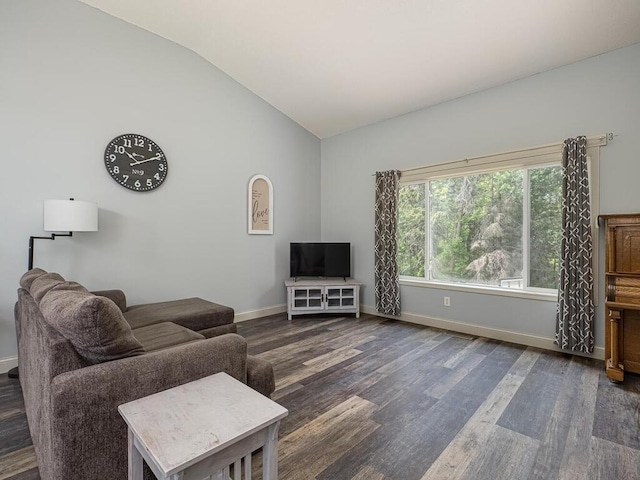 15564 Vale St NW, Andover, MN 55304 - living room featuring vaulted ceiling, dark wood-style flooring, and baseboards