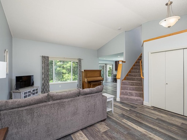 15564 Vale St NW, Andover, MN 55304 - living room with vaulted ceiling, wood finished floors, stairway, and baseboards