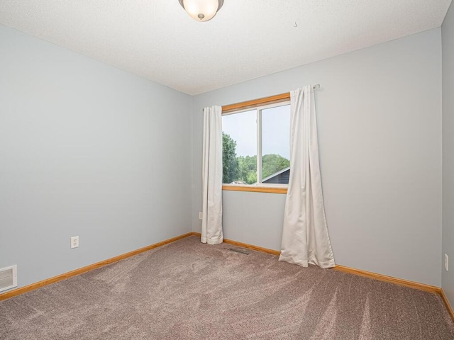 15564 Vale St NW, Andover, MN 55304 - carpeted spare room featuring baseboards