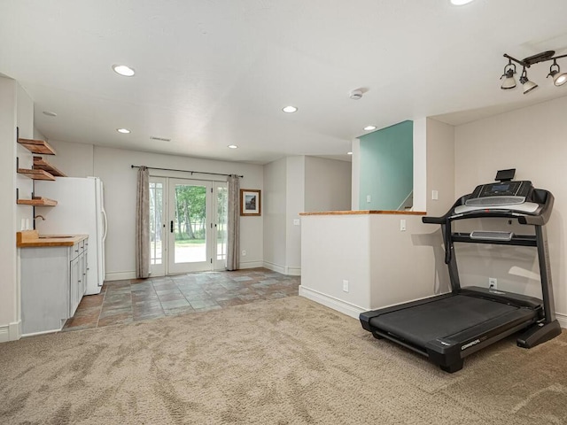 15564 Vale St NW, Andover, MN 55304 - exercise room featuring light colored carpet, baseboards, recessed lighting, and a sink