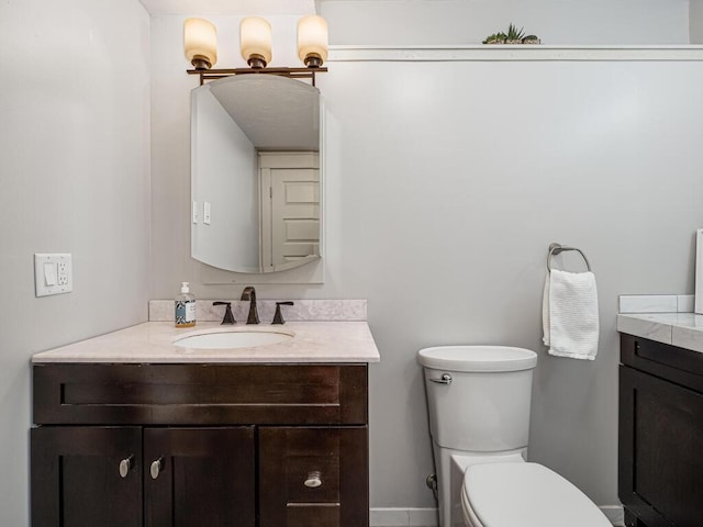 15564 Vale St NW, Andover, MN 55304 - bathroom with vanity and toilet