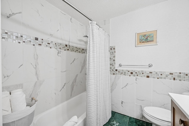 631 Bench St, Taylors Falls, MN 55084 - full bathroom featuring shower / bath combo with shower curtain, tile walls, a textured ceiling, vanity, and toilet