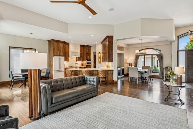 11883 Flanders Cir NE, Blaine, MN 55449 - living area featuring dark wood-style floors and ceiling fan
