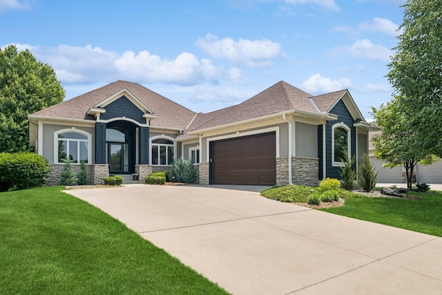 11883 Flanders Cir NE, Blaine, MN 55449 - craftsman-style house with stone siding, a front yard, an attached garage, and stucco siding