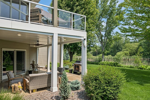 11883 Flanders Cir NE, Blaine, MN 55449 - patio / terrace featuring ceiling fan, a patio, and a lawn