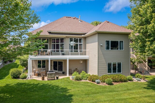 11883 Flanders Cir NE, Blaine, MN 55449 - rear view of property with a patio, stairs, a lawn, and roof with shingles