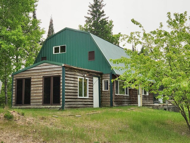 26575 US-71, Arago Twp, MN 56470 - back of house with metal roof and a gambrel roof