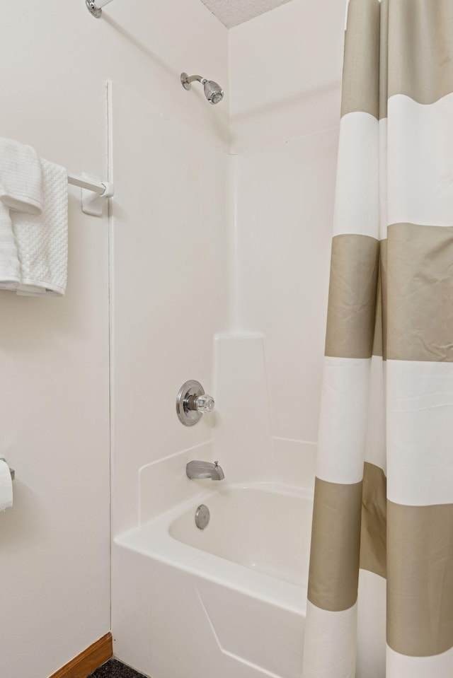 2517 Cobble Hill Ct Unit I, Woodbury, MN 55125 - full bathroom featuring shower / tub combo