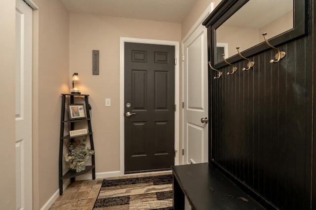 201 Chandler Ct, Jordan, MN 55352 - mudroom featuring baseboards
