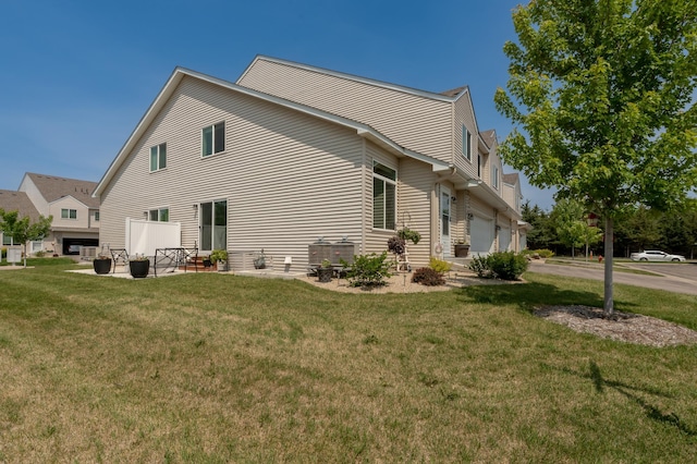 201 Chandler Ct, Jordan, MN 55352 - view of property exterior with a garage and a yard