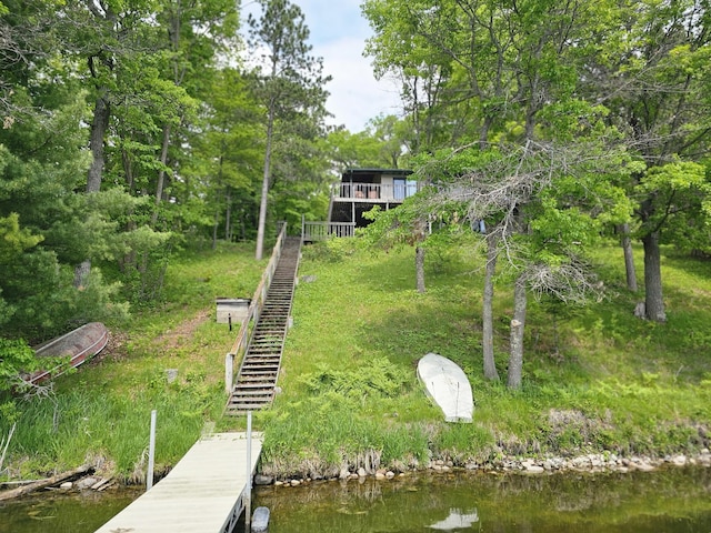 24429 Camp Lake Rd, Garrison, MN 56401 - back of house featuring stairway and a water view