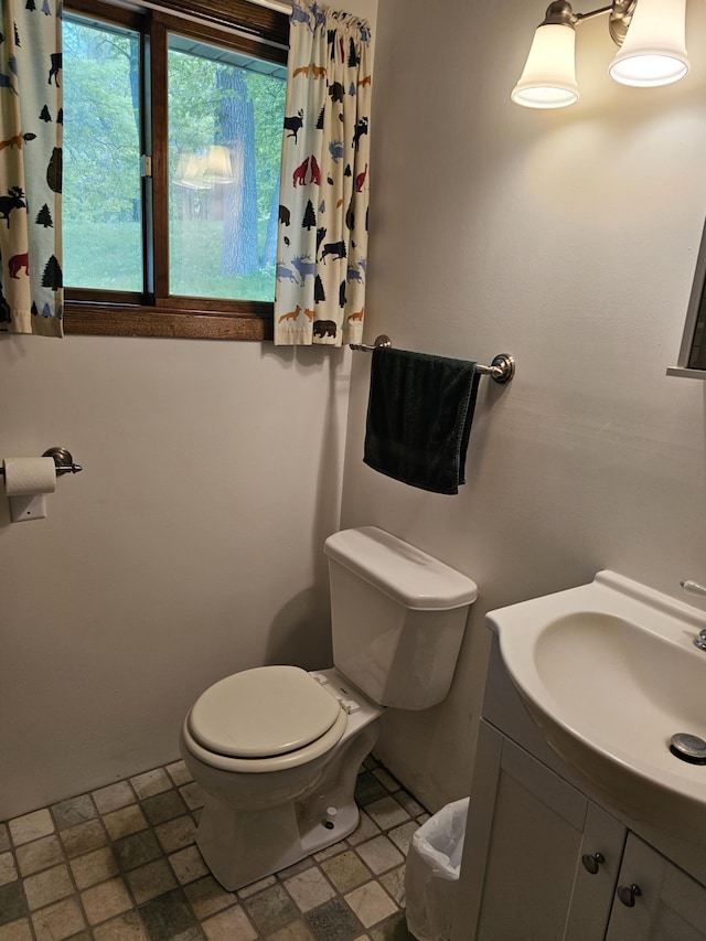 24429 Camp Lake Rd, Garrison, MN 56401 - bathroom featuring toilet and vanity