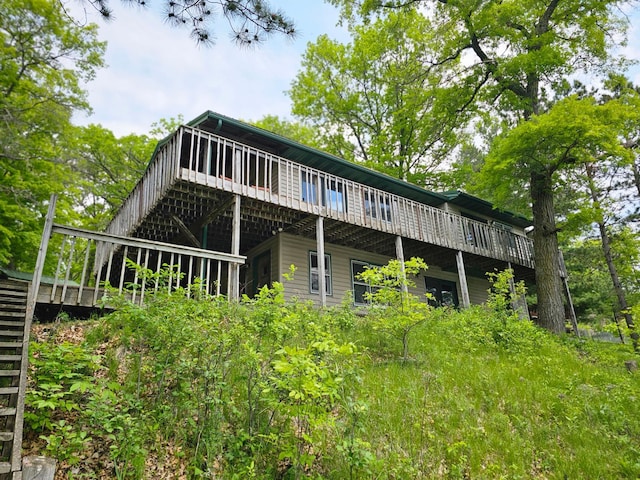 24429 Camp Lake Rd, Garrison, MN 56401 - back of house featuring a wooden deck and stairway