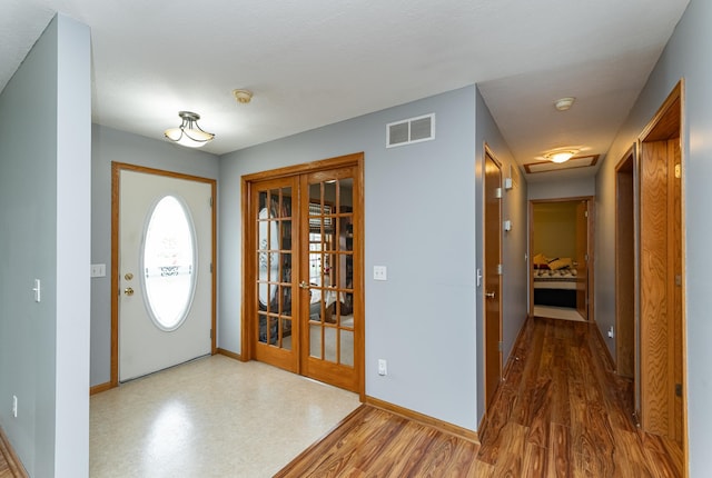 1218 6th St NW, Dodge Center, MN 55927 - entrance foyer with french doors and baseboards