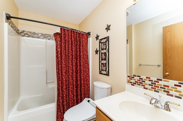 1218 6th St NW, Dodge Center, MN 55927 - full bathroom with toilet, vanity, shower / tub combo, and tasteful backsplash
