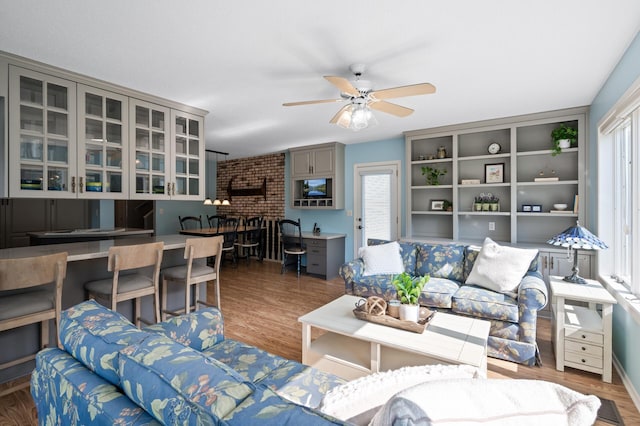 1902 Duck Pond Dr W, Saint Paul, MN 55118 - living area with plenty of natural light, a ceiling fan, and wood finished floors