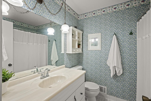 1902 Duck Pond Dr W, Saint Paul, MN 55118 - bathroom featuring vanity, curtained shower, and tile patterned floors