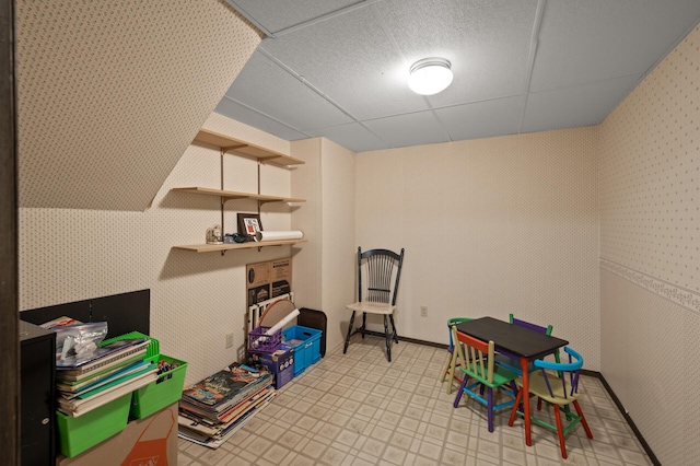 1902 Duck Pond Dr W, Saint Paul, MN 55118 - rec room featuring a paneled ceiling, light flooring, and wallpapered walls