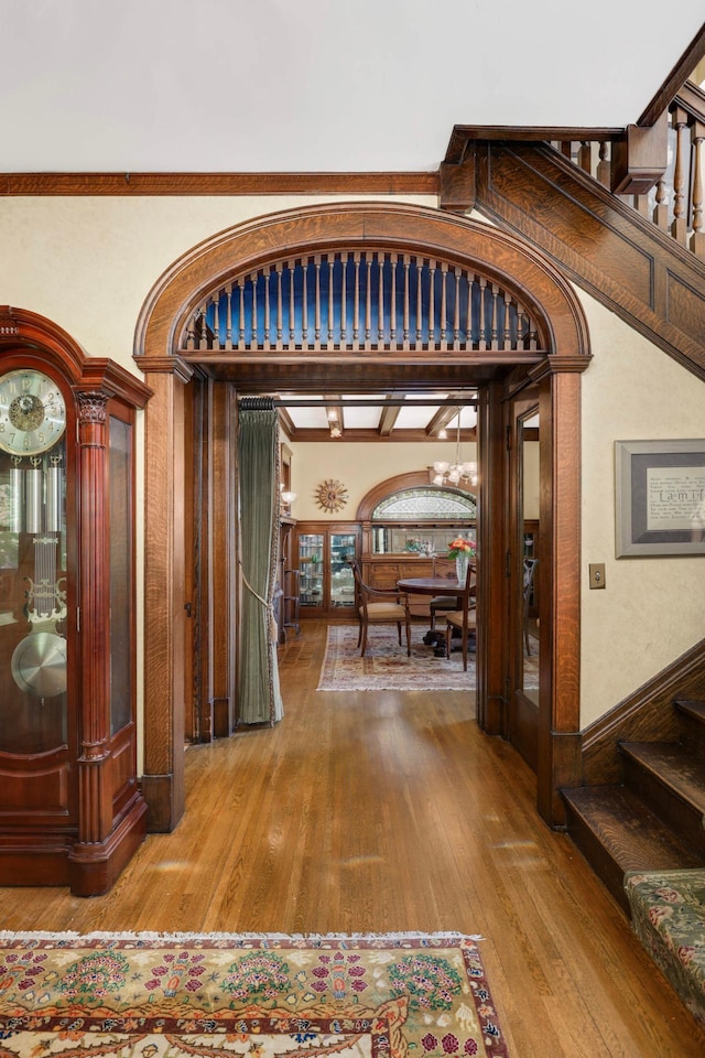 880 Fairmount Ave, Saint Paul, MN 55105 - entryway with stairway, wood finished floors, and ornamental molding