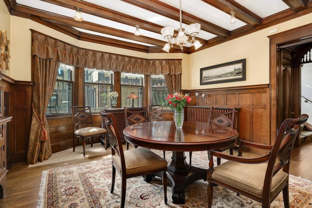 880 Fairmount Ave, Saint Paul, MN 55105 - dining space featuring a chandelier, a wainscoted wall, beamed ceiling, and wood finished floors