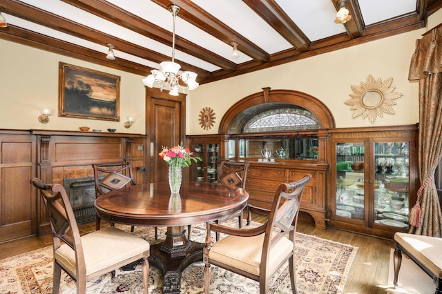 880 Fairmount Ave, Saint Paul, MN 55105 - dining area featuring beamed ceiling, a chandelier, and light wood-type flooring