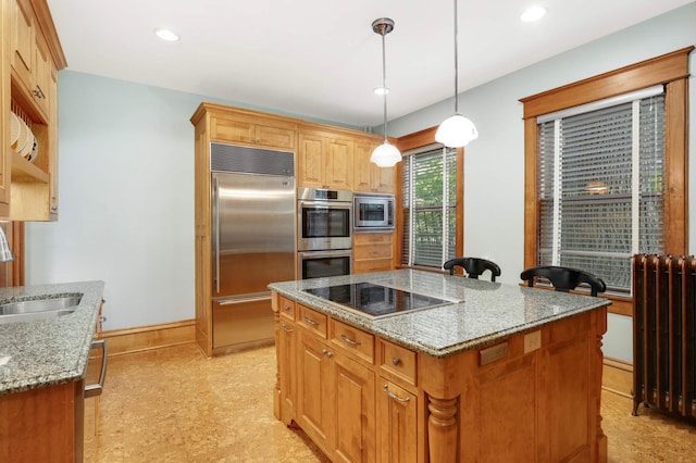 880 Fairmount Ave, Saint Paul, MN 55105 - kitchen with built in appliances, light stone counters, a center island, hanging light fixtures, and recessed lighting