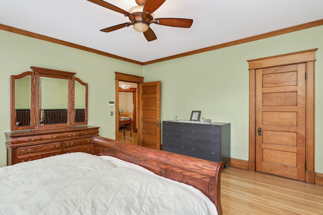 880 Fairmount Ave, Saint Paul, MN 55105 - bedroom with crown molding, wood finished floors, and a ceiling fan
