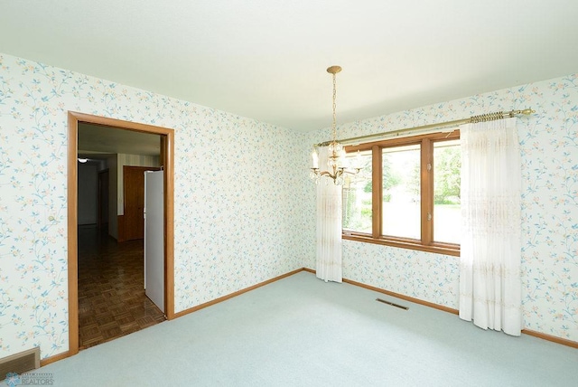 507 24th Ave S, Fargo, ND 58103 - unfurnished dining area with a chandelier and wallpapered walls