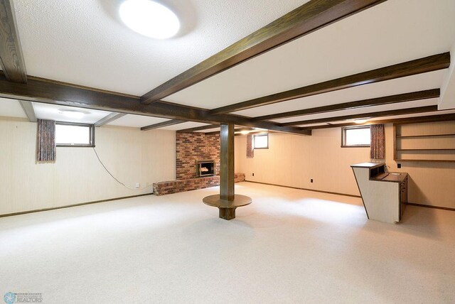 507 24th Ave S, Fargo, ND 58103 - basement with a brick fireplace and wood walls