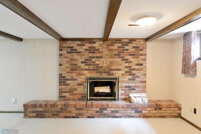 507 24th Ave S, Fargo, ND 58103 - detailed view of beam ceiling, a fireplace, and carpet flooring