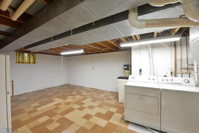 507 24th Ave S, Fargo, ND 58103 - finished below grade area featuring separate washer and dryer and light flooring