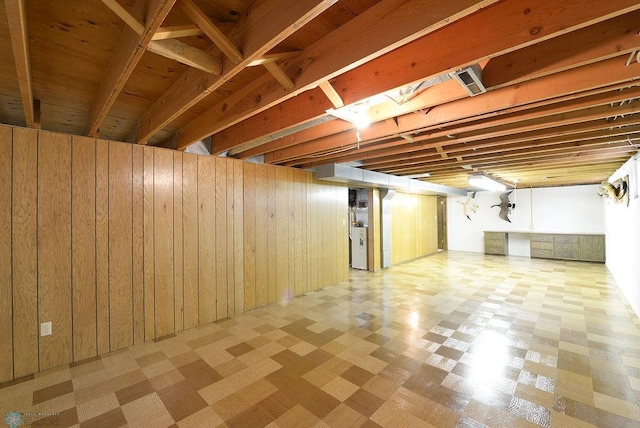 507 24th Ave S, Fargo, ND 58103 - finished below grade area with tile patterned floors and wood walls