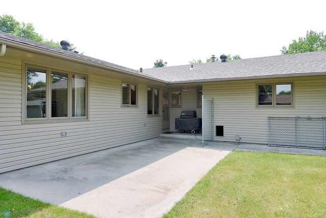 507 24th Ave S, Fargo, ND 58103 - property entrance with a patio area and a yard
