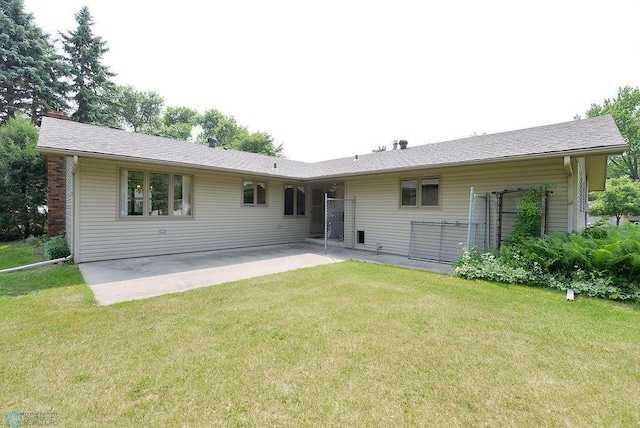 507 24th Ave S, Fargo, ND 58103 - back of house with a patio and a yard