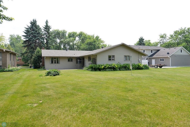 507 24th Ave S, Fargo, ND 58103 - rear view of property with a lawn