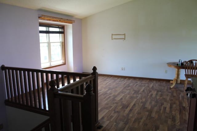 1027 Taft St S, Cambridge, MN 55008 - corridor with an upstairs landing and dark wood-style floors