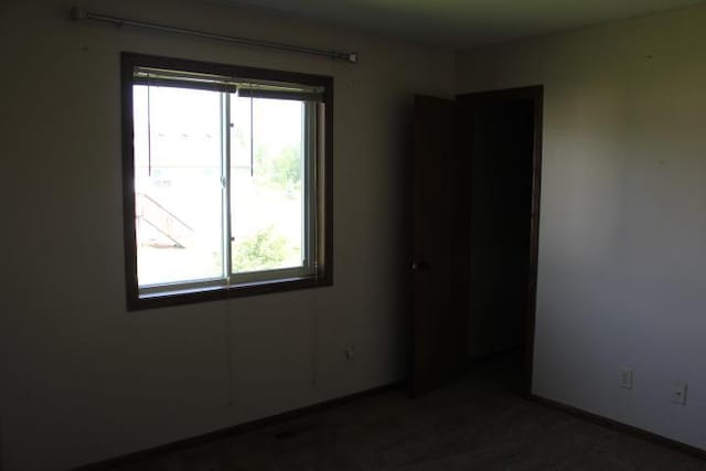 1027 Taft St S, Cambridge, MN 55008 - spare room featuring plenty of natural light