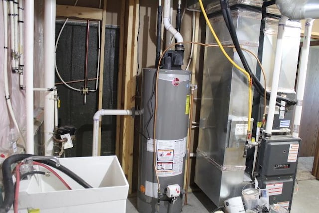 1027 Taft St S, Cambridge, MN 55008 - utilities with gas water heater and a sink