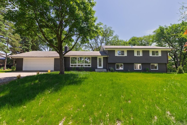 2307 Sherwood Cir, Bloomington, MN 55431 - split level home featuring driveway and an attached garage