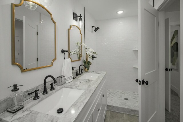 2307 Sherwood Cir, Bloomington, MN 55431 - full bathroom featuring double vanity and a tile shower