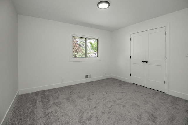 2307 Sherwood Cir, Bloomington, MN 55431 - unfurnished bedroom featuring carpet flooring, baseboards, and a closet