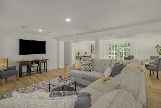 2307 Sherwood Cir, Bloomington, MN 55431 - living room with french doors, light wood finished floors, recessed lighting, and baseboards