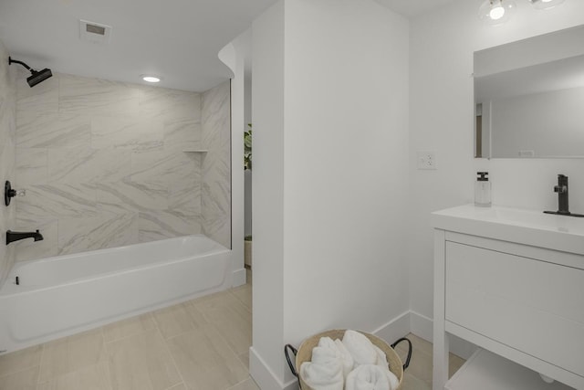 2307 Sherwood Cir, Bloomington, MN 55431 - bathroom featuring vanity, shower / tub combination, and baseboards