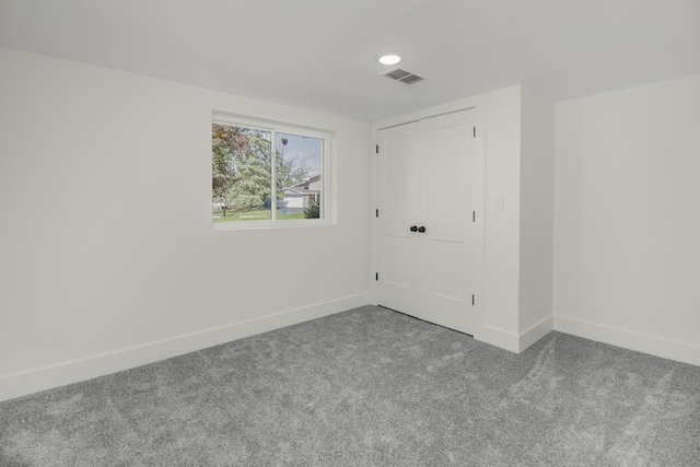 2307 Sherwood Cir, Bloomington, MN 55431 - unfurnished bedroom with carpet floors, baseboards, and a closet
