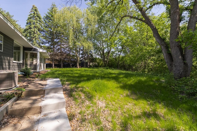2307 Sherwood Cir, Bloomington, MN 55431 - view of yard featuring central AC
