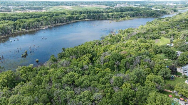2307 Sherwood Cir, Bloomington, MN 55431 - aerial view of property and surrounding area featuring a heavily wooded area and a nearby body of water