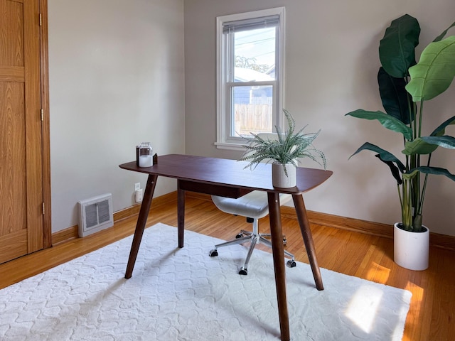 1759 Arlington Ave E, Saint Paul, MN 55106 - office area featuring baseboards and wood finished floors